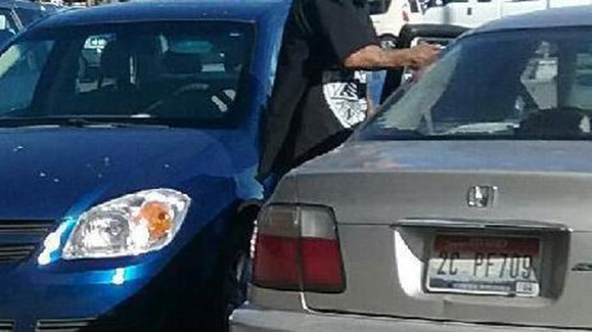 Nampa police are looking for this man, photographed getting into a stolen car in the Nampa Fred Meyer parking lot recently.