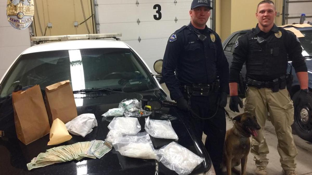 Nampa officers pictured with drugs seized in a Jan. 11 traffic stop in Nampa.