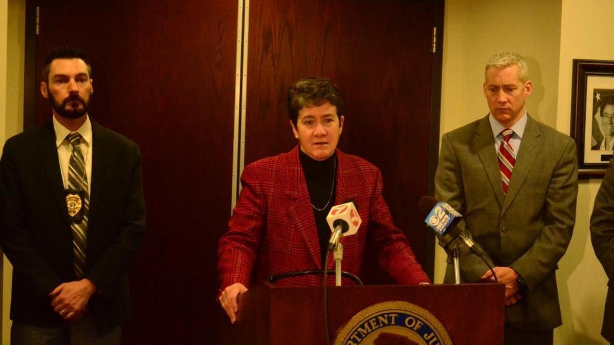 US Attorney for Idaho Wendy Olson praises the work of several law enforcement agencies, from the Idaho Department of Parole and Probation to the Boise Police Department for their work in investigating sex trafficker Michael W. Wade, 31. Standing with her at a press conference Thursday are Brandon Williams, left, deputy district manager of the Idaho Department of Correciton, and Doug Hart, supervisory senior resident FBI agent Doug Hart.
