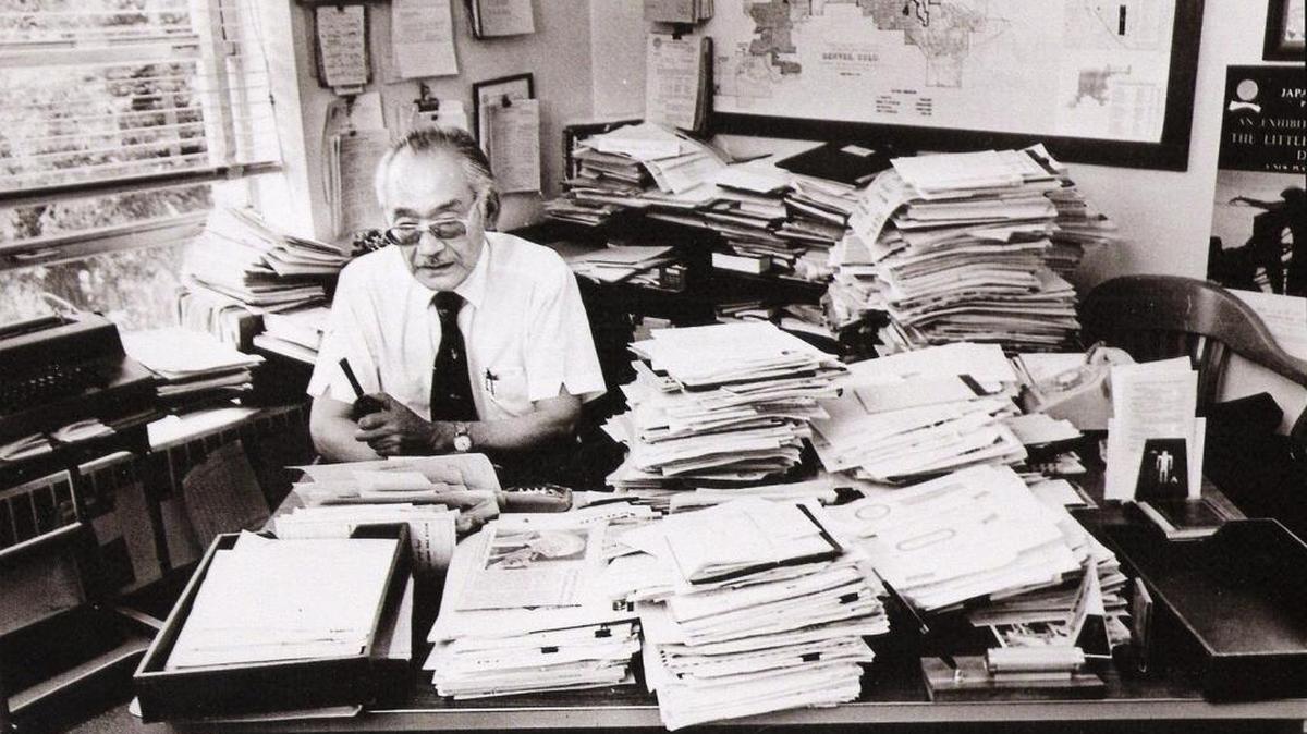 Minoru Yasui at his desk at his Denver law firm, in an undated photo.