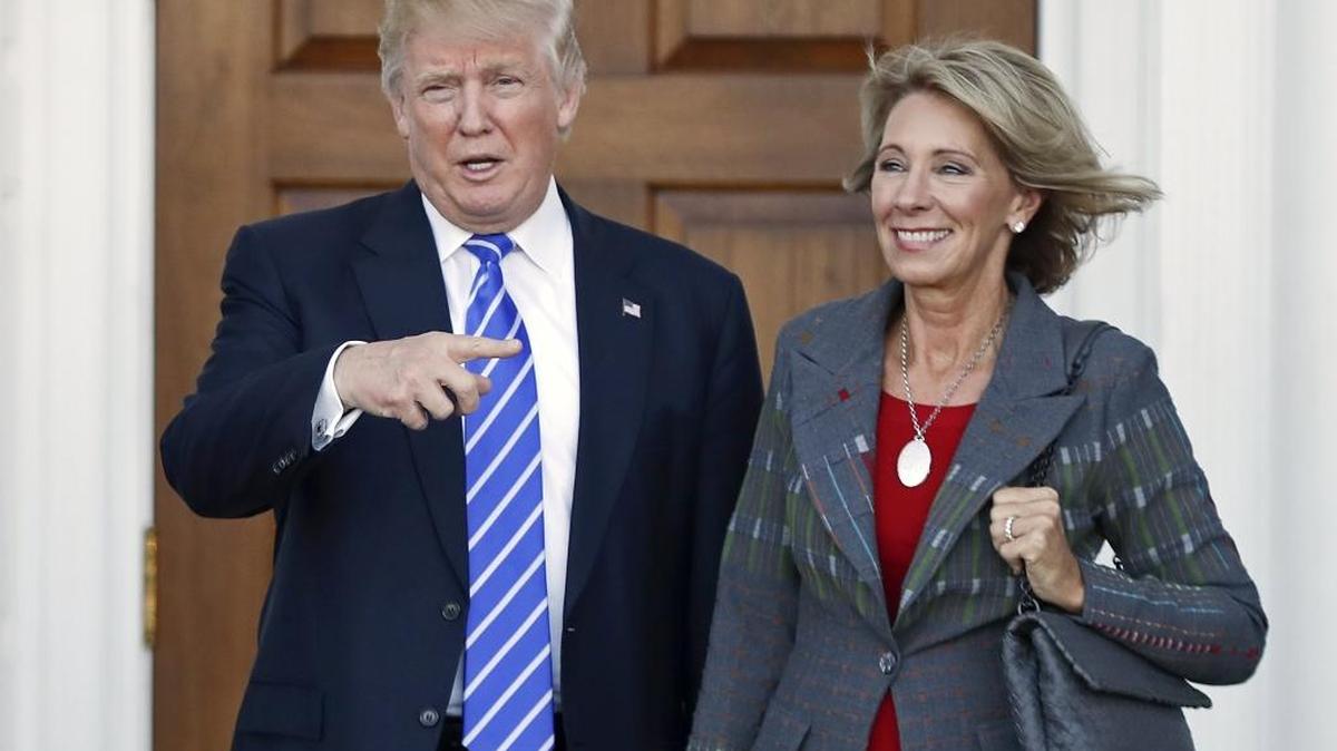President-elect Donald Trump, left, and Betsy DeVos, Trump’s education secretary nominee.