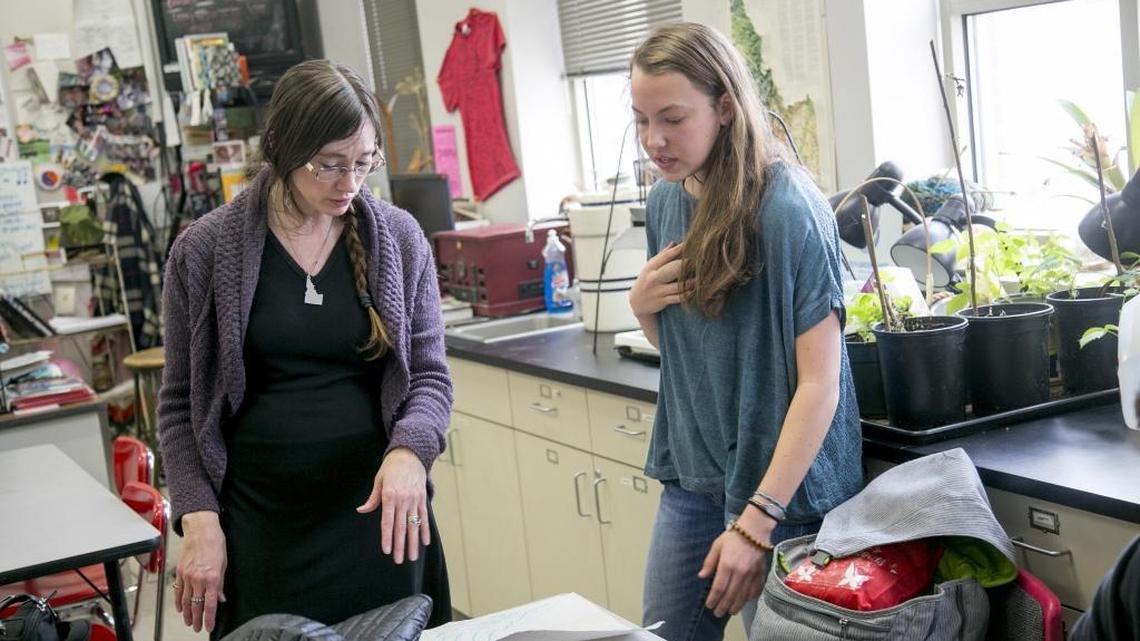 Boise High School student Mahalie Hill, 17, talks with AP environmental science class teacher Alison Ward about her project examining the effects of climate change.