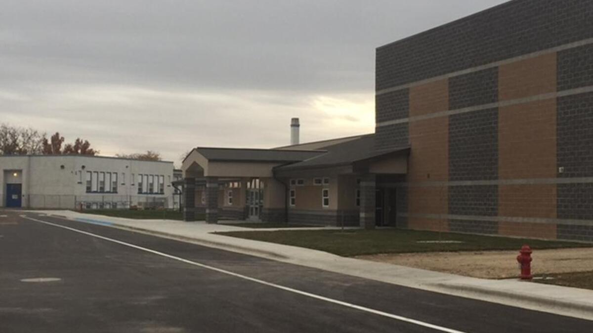 Notus Elementary School’s new 33,000-square-foot building will replace a 90-year-old structure on the left.