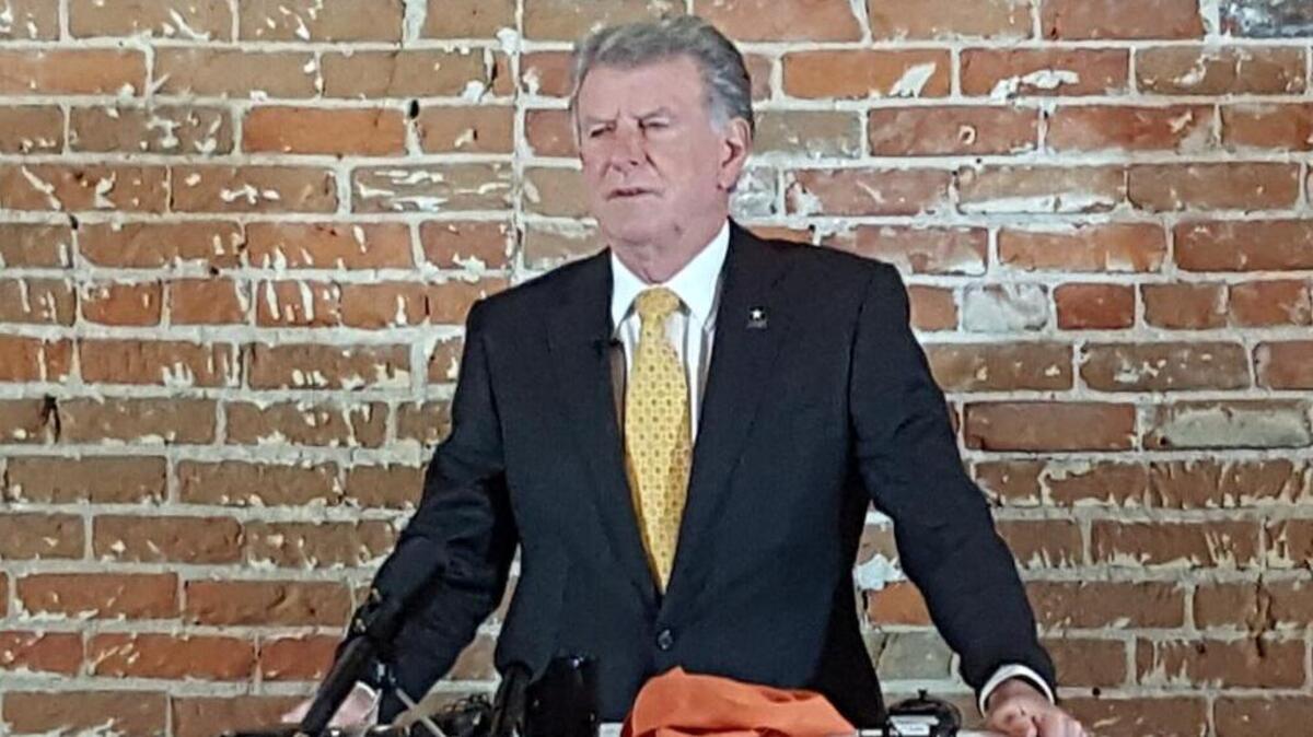 Gov. Butch Otter speaks to reporters Thursday during a forum organized by the Idaho Press Club.