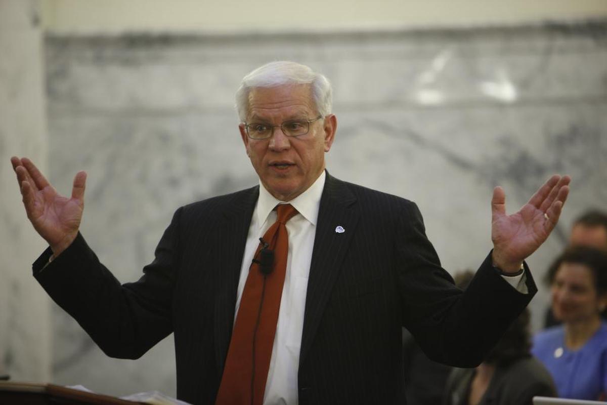 Boise State University President Bob Kustra speaks to the Joint Finance-Appropriations Committee at the Idaho Legislature in 2010.