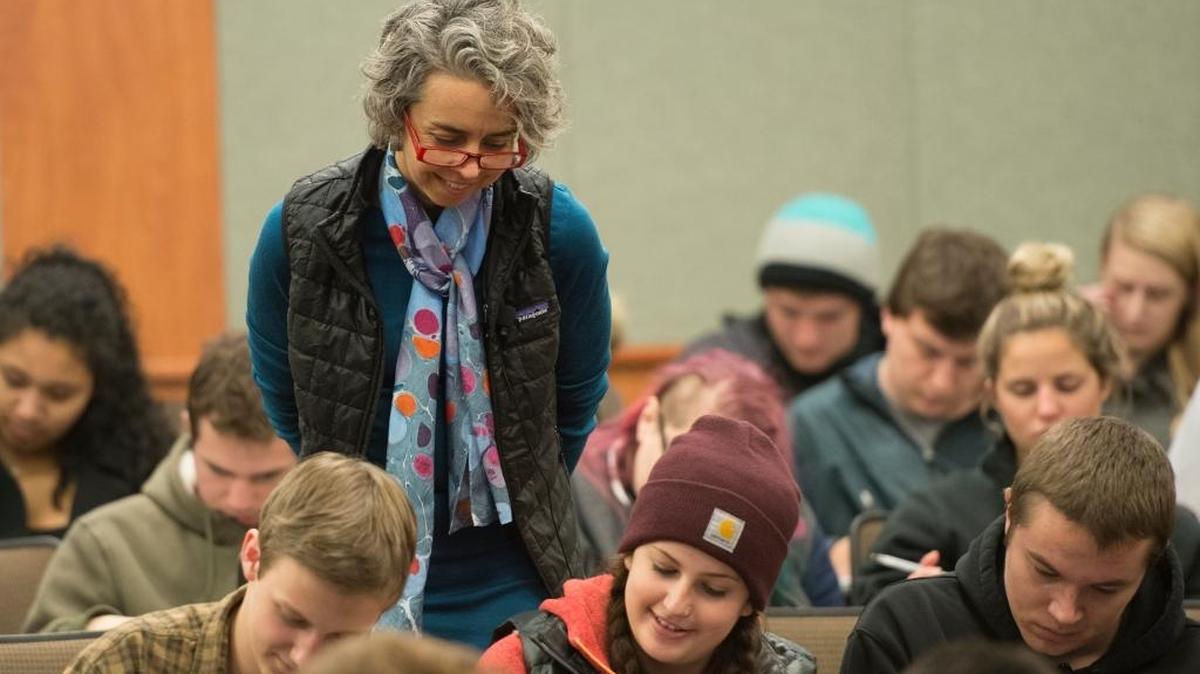 Susan Shadle, a Boise State chemistry professor, works with students during one of her large classes.