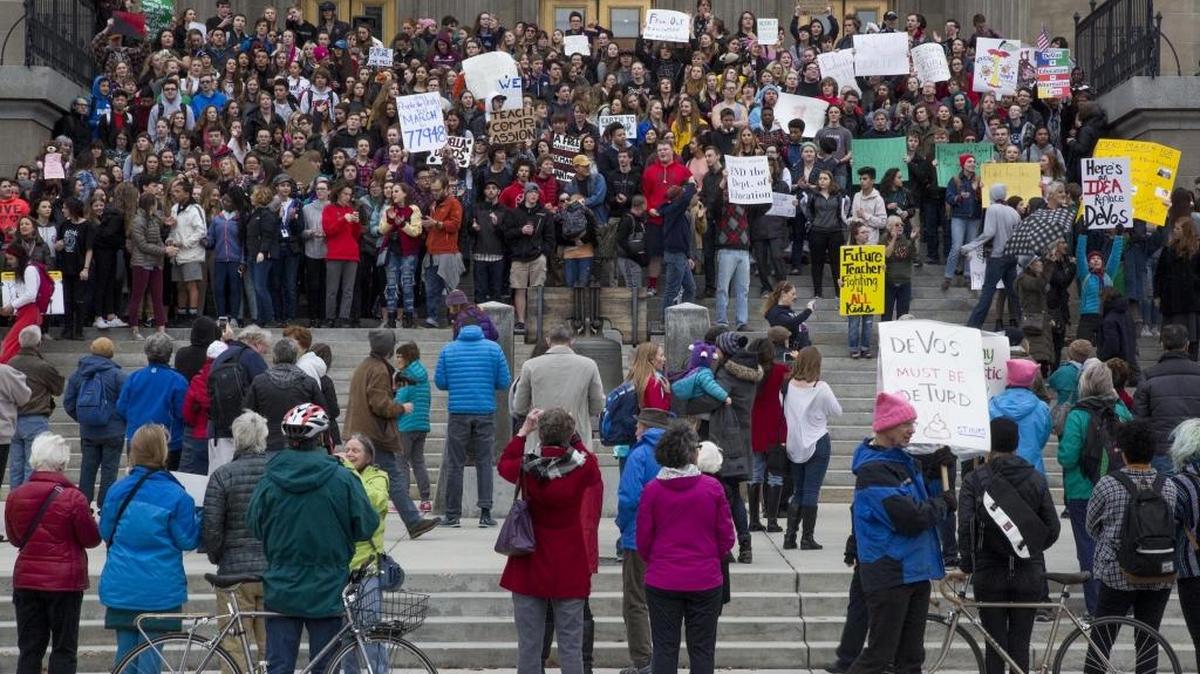 Students from local high schools and colleges held held a walkout Thursday and gathered at the Capitol to support public education and protest Betsy DeVos, the new U.S. secretary of education.