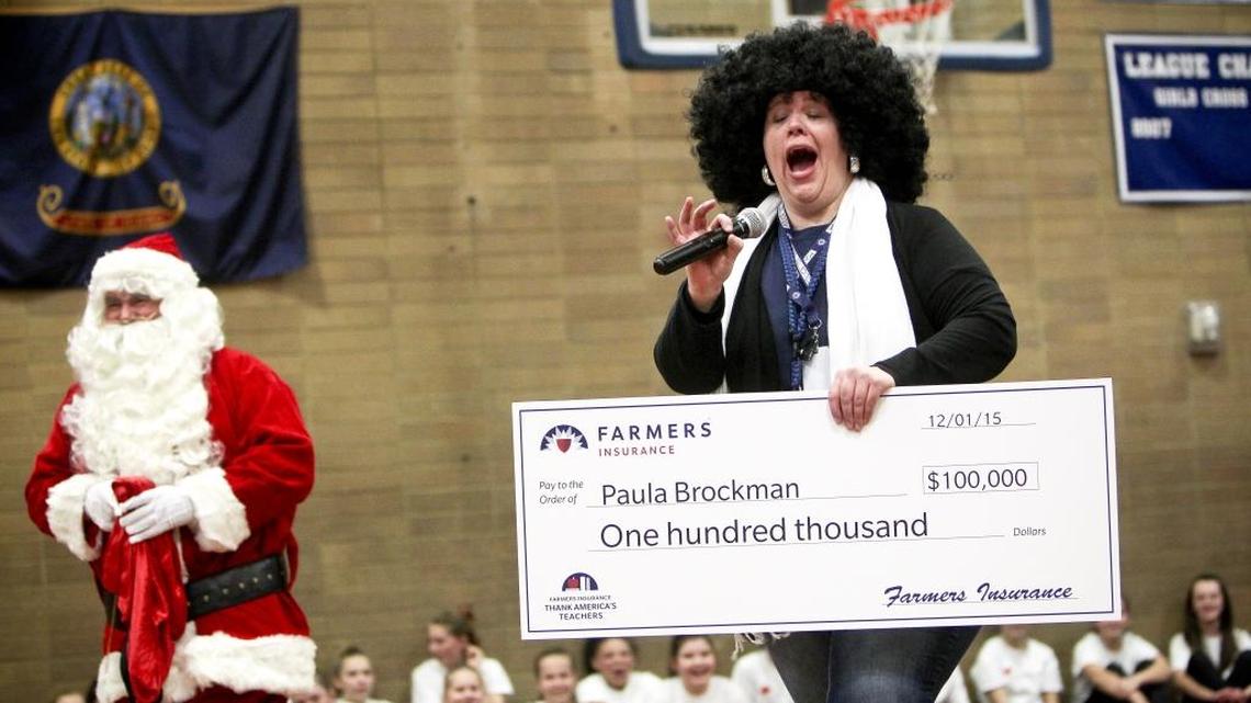 Lowell Scott Middle School teacher Paula Brockman thought she was participating in a school assembly to launch Lowell Scott’s annual giving program for Christmas. But she was surprised with a gift that will bring a new way to learn to the 1,020-student school. She got the gift from Meridian Farmers Insurance agent Fred Kesler, dressed as Santa.