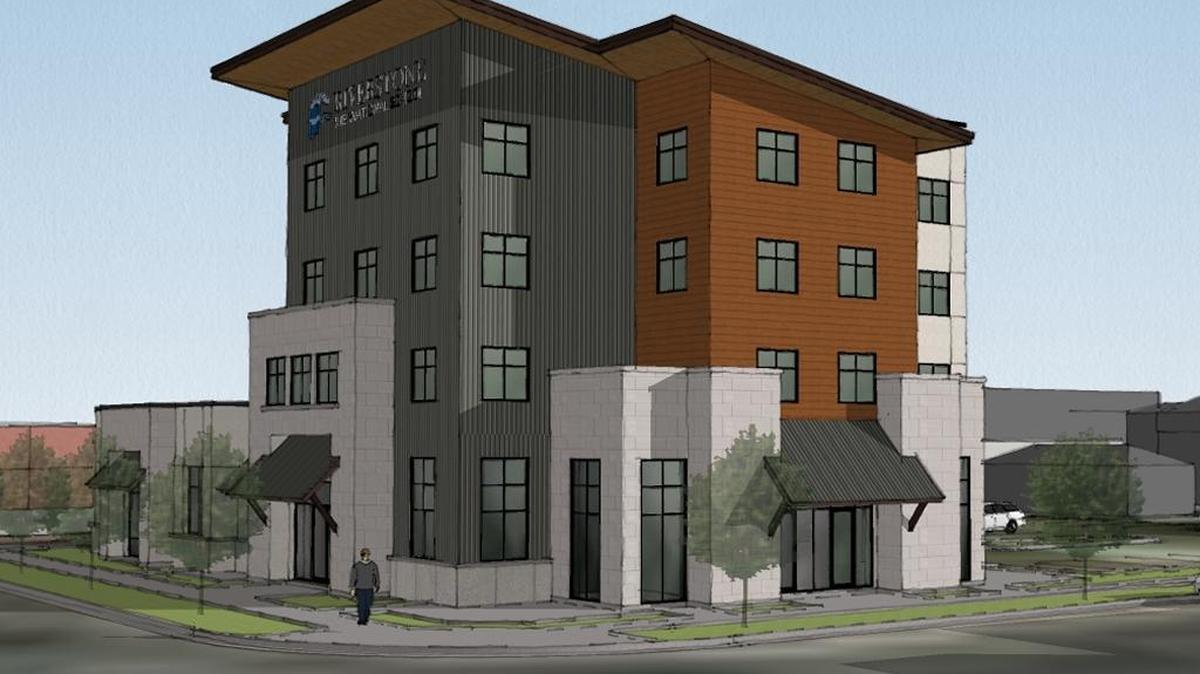 Planned residential boarding building for Riverstone International School at 13th and River streets.