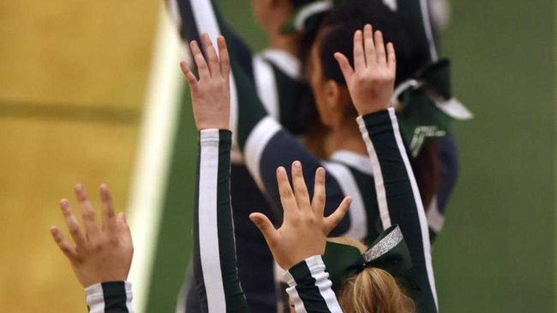 Burley cheerleaders root for their team against Minico in this Times News file photo from Jan. 8, 2016, at Burley High School.