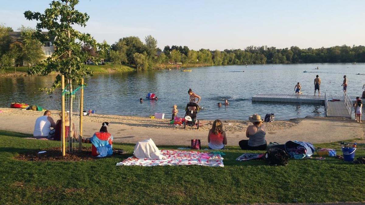 Esther Simplot Park and Quinns Pond is a community hub of activity on hot days, from sunbathing to swimming to stand-up paddleboarding. The Boise forecast shows record-breaking temperatures on Tuesday, May 12.