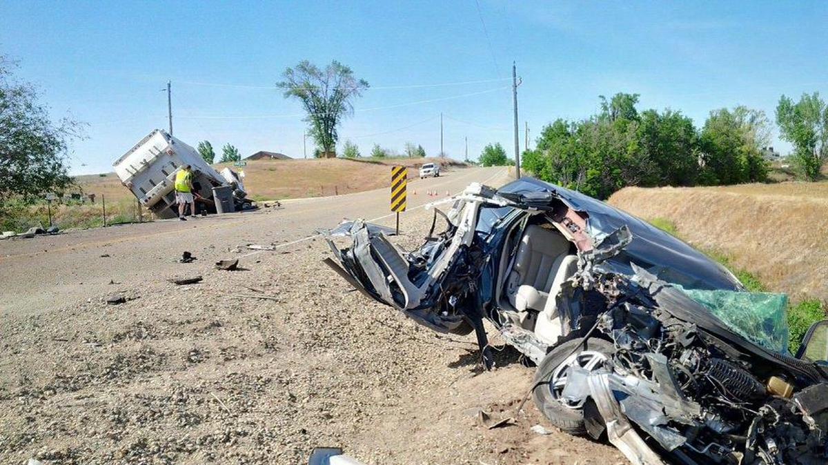 Two were injured in a crash involving a garbage truck and a car.