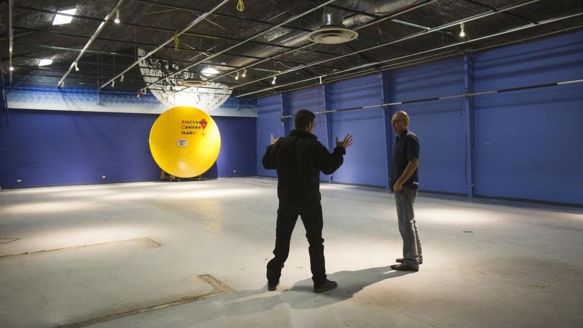 Eric Miller, right, exhibits director at the Discovery Center of Idaho, and Mark O'Brien, exhibits designer, talk in one of the galleries that is being renovated.