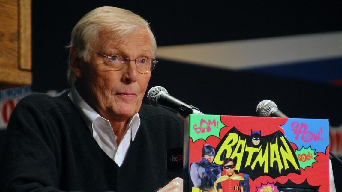 In this 2014 photo, Adam West speaks on a panel about the “Batman: The Complete Television Series, Deluxe Edition” DVD at Comic Con in New York.