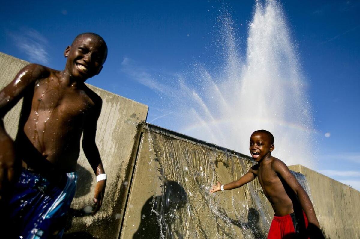 This photo from the City of Boise's annual Fourth of July celebrations in 2016 show children cooling off in the heat. Independence Day may be as hot as 96 degrees this year.
