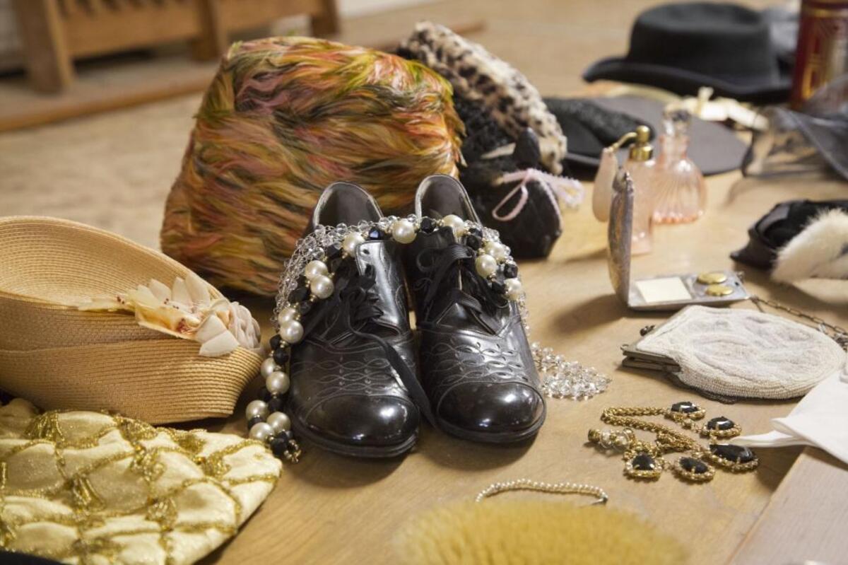 Some of the artifacts that have been donated for a display in the refurbished building came from a family whose parents honeymooned at the old Dewey Palace hotel and would often dress up to spend fashionable and special occasions there.
