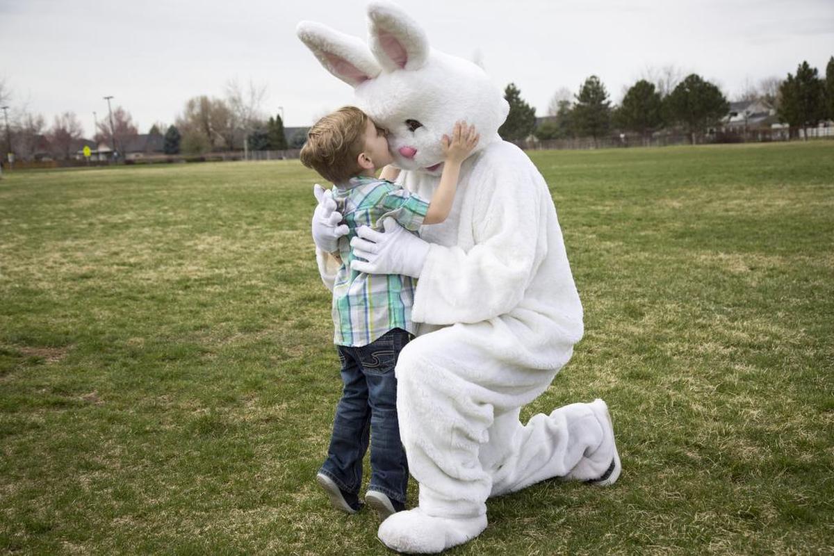 Jestin Riach, 3, gets a really close look at the Easter Bunny.