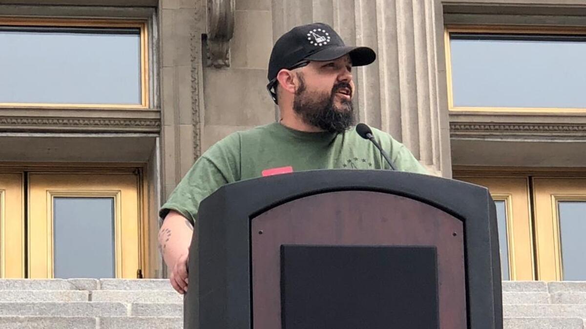 Eric Parker, organizer of Idaho’s Americans for America event, addresses the crowd Saturday at the Idaho Capitol.