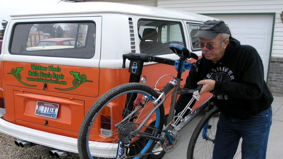 Tyler Welshimer in front of his Nampa home with “Big Herbie,” his 1998 VW bus. The semi-retired bike mechanic said she’s more concerned about being killed by distracted drivers — he’s seen people typing on their laptops while driving on Interstate 84 — than random attacks by gunmen.