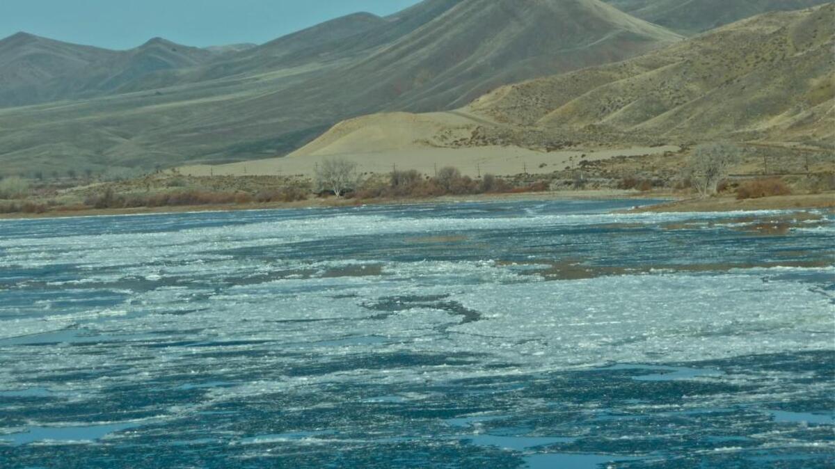 An ice jam begins to form on the Snake River near Farewell Bend, Ore., and the Weiser Sand Dunes in December 2009. Similar freezing activity has contributed to flooding concerns along the Snake River this winter.