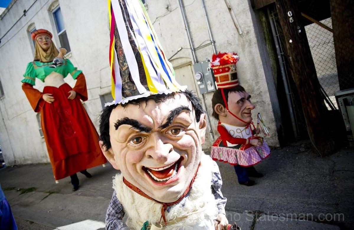 Irrintzi performers from San Sebastian in the Basque country dressed as puppets marched through an alley during Boise's 2015 Jaialdi celebration.
