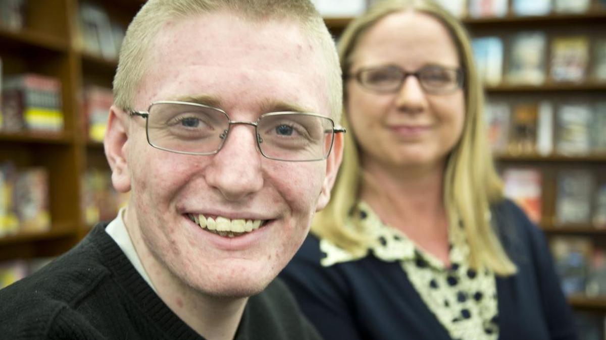 Eric Walton, 16, will be giving a TedXBoise talk called “Strength through Fear” at the Egyptian on Saturday. “There’s one thing I can claim to be an expert in,” he said. “I know a lot about growing up with a mental illness.” Liza Long, his mother, is in the background. She has written many pieces about Eric’s life and mental illness.