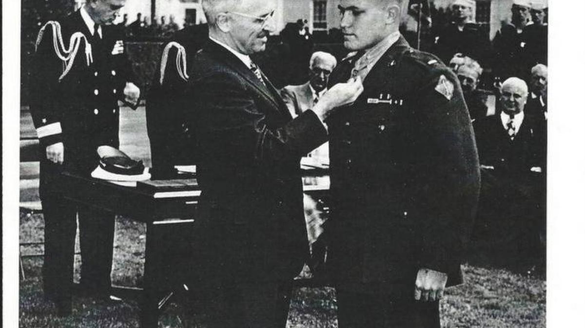 President Harry S Truman pins the Medal of Honor on Art Jackson during an Oct. 5, 1945, ceremony on the lawn outside the White House.