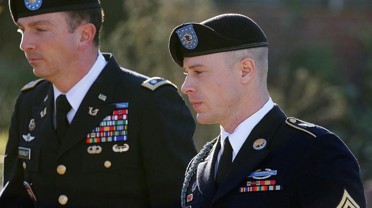 Army Sgt. Bowe Bergdahl, right, arrives for a pretrial hearing at Fort Bragg, N.C., with his defense counsel Lt. Col. Franklin D. Rosenblatt, left, on Tuesday, Jan. 12, 2016.