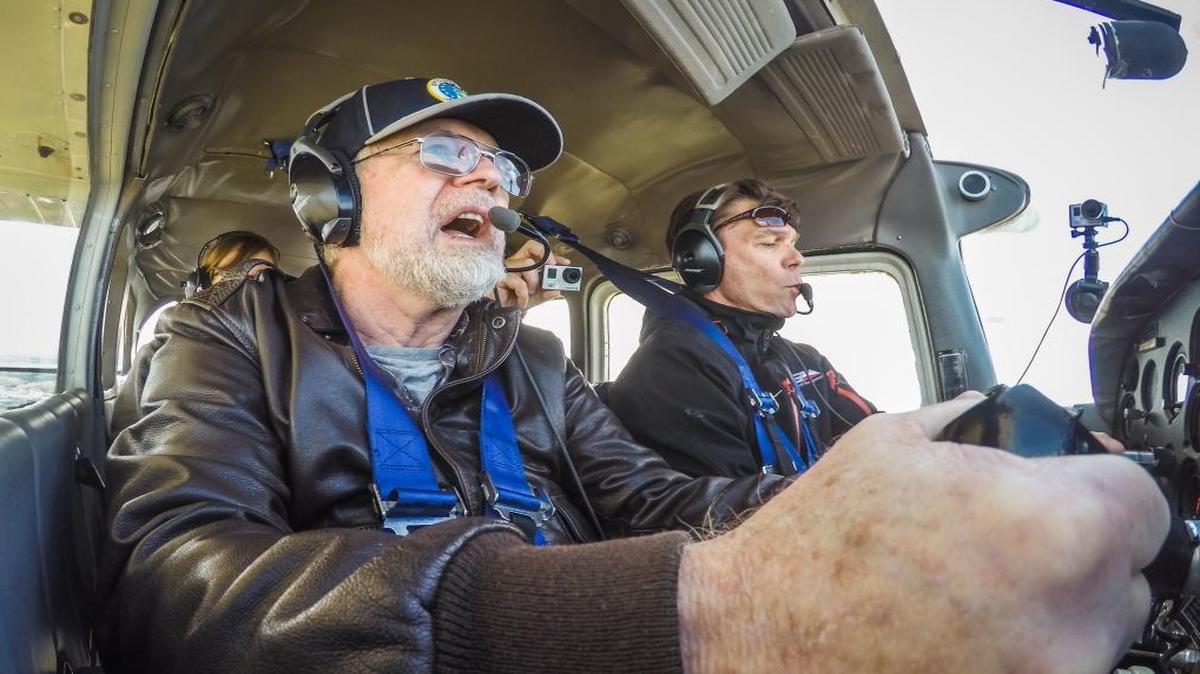 Lee Roberson, left assists pilot Scotty Crandlemire as they flew together over the Treasure Valley. It was the first time in a decade that the retired Air Force helicopter pilot had flown in a private plane.
