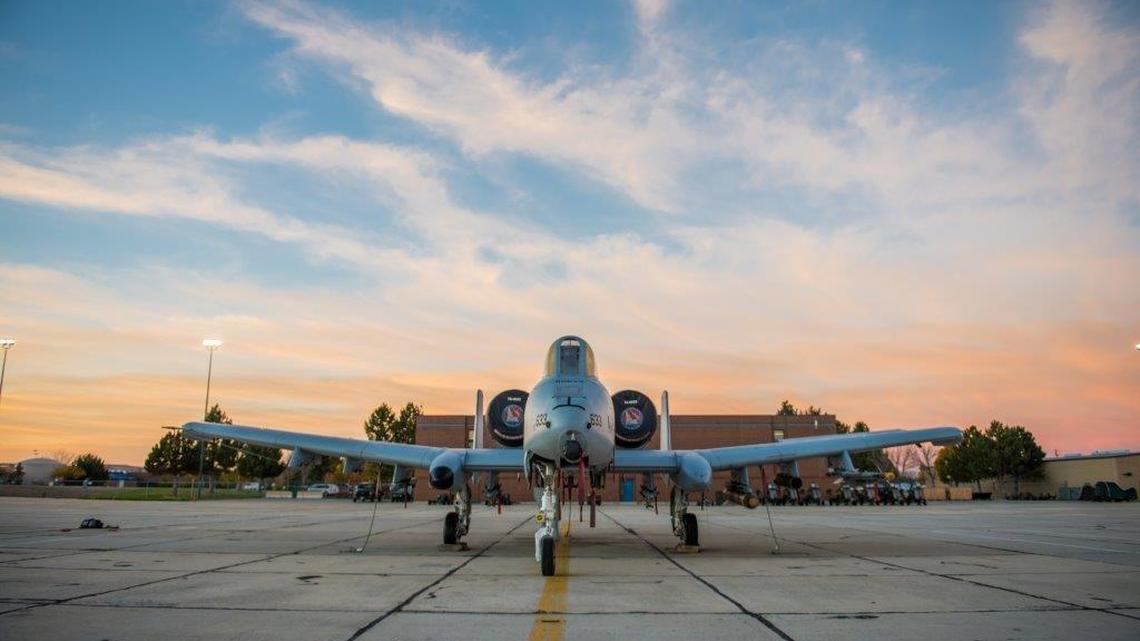 An A-10C Thunderbolt II from the Idaho Air National Guard’s 124th Fighter Wing sits on the flight line during sunrise at Gowen Field.