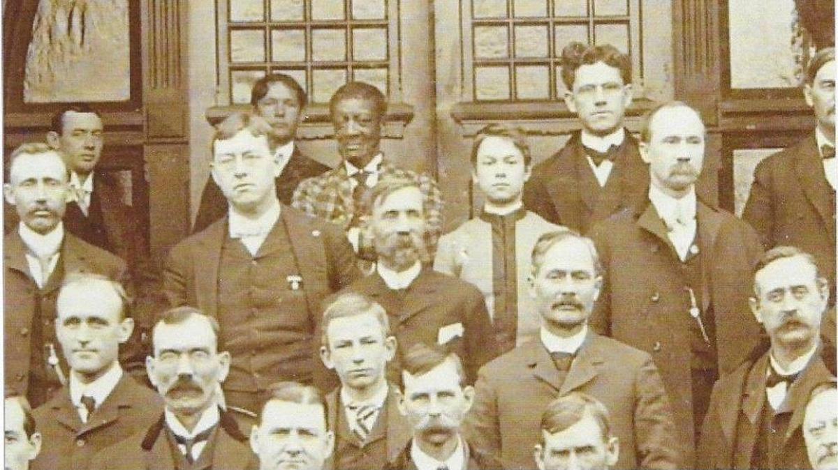 John West with legislators in 1901.