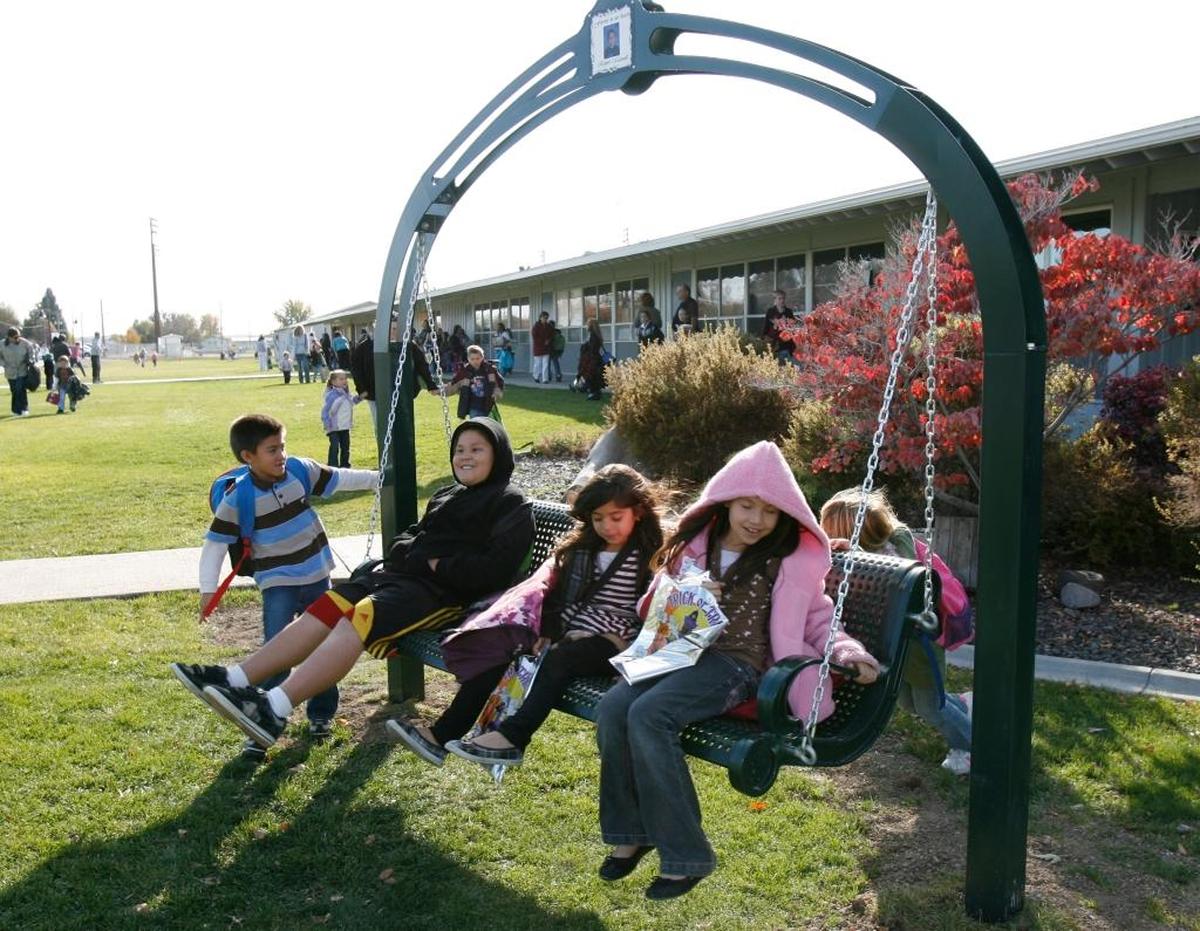 New Plymouth, where Robert Manwill lived with his father for most of the year, has never forgotten him. In addition to the annual auction to support his scholarship fund, New Plymouth Elementary installed a special swing several years ago on the school grounds. A photograph of Robert adorns the arch.