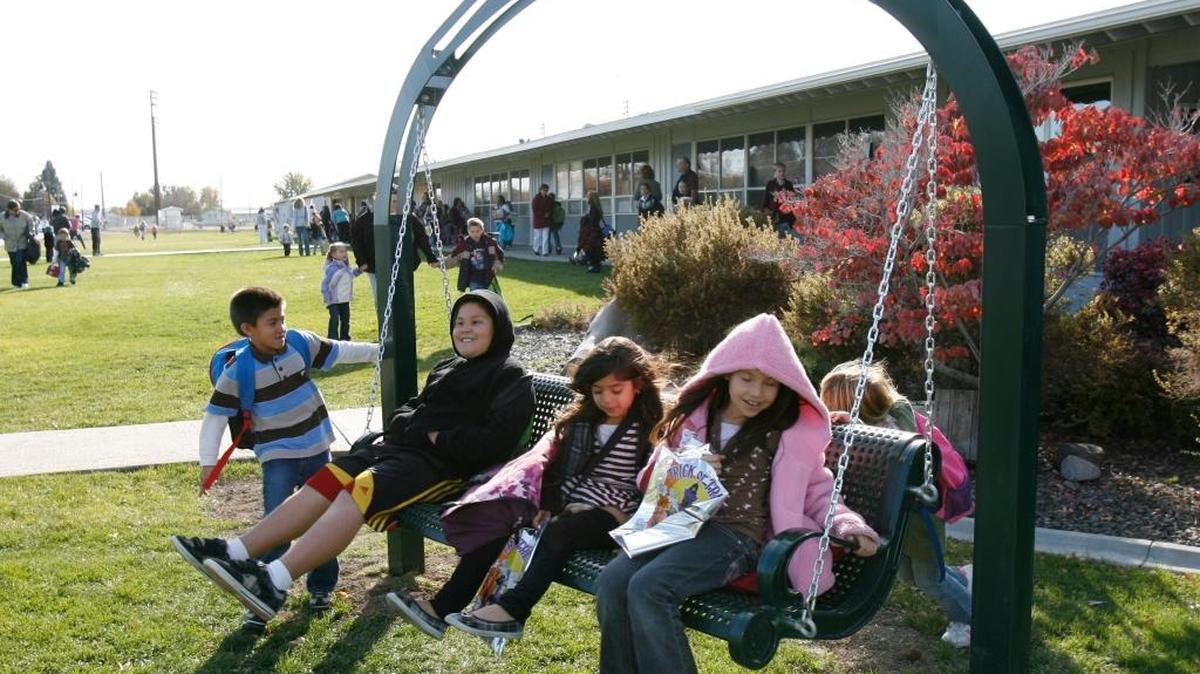 New Plymouth, where Robert Manwill lived with his father for most of the year, has never forgotten him. In addition to the annual auction to support his scholarship fund, New Plymouth Elementary installed a special swing several years ago on the school grounds. A photograph of Robert adorns the arch.
