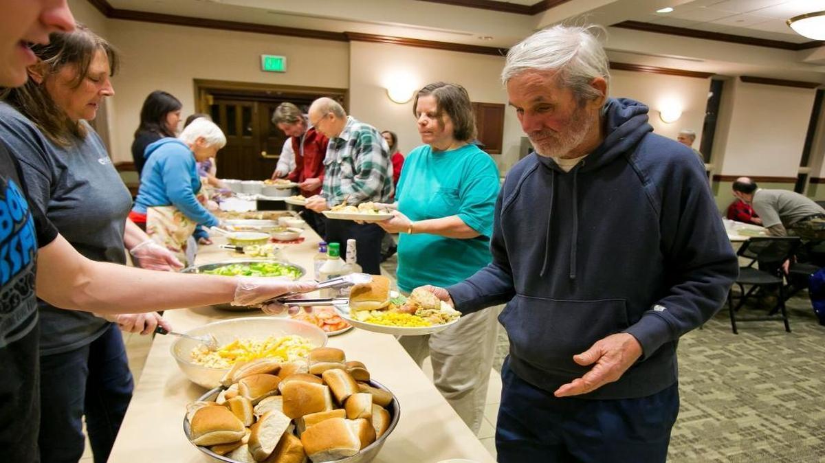 Volunteers serving a New Year’s Day meal to residents during a recent holiday season at First Presbyterian Church in Boise. Do you know of organizations that need volunteer help over the holidays in 2016? Email reporter Anna Webb at awebb@idahostatesman.com.