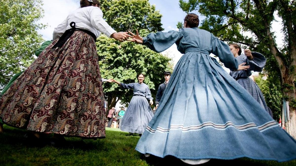 Members of a Civil War reenactors group dance together during a past “Museum Comes to Life” event at the Idaho Historical Museum. The living history day includes demonstrations in woodcarving, calligraphy, rug hooking, hat making, weaving, quilting and other activities.