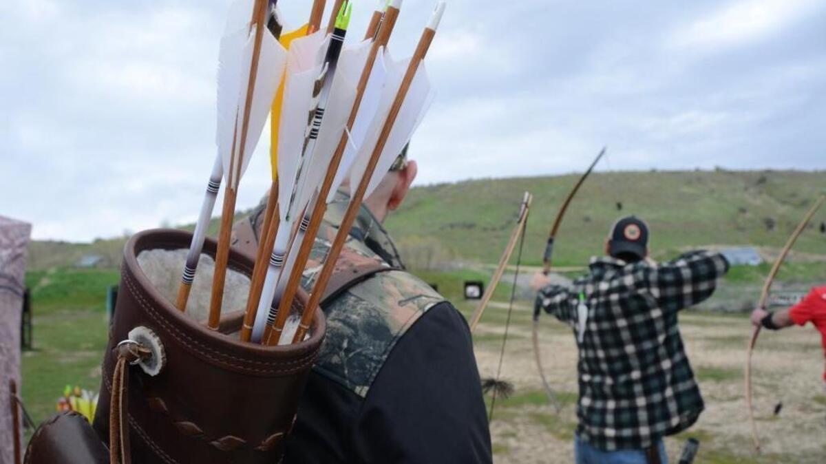 Bob Anderson, of Meridian, looks on as Clay Hayes, a bowmaker at Twisted Stave, takes aim at a target on April 15, 2018. The Backcountry Hunters & Anglers rendezvous wrapped up at the archery range at Boise’s Military Reserve after a weekend of seminars and events dedicated to outdoor recreation and public land use.