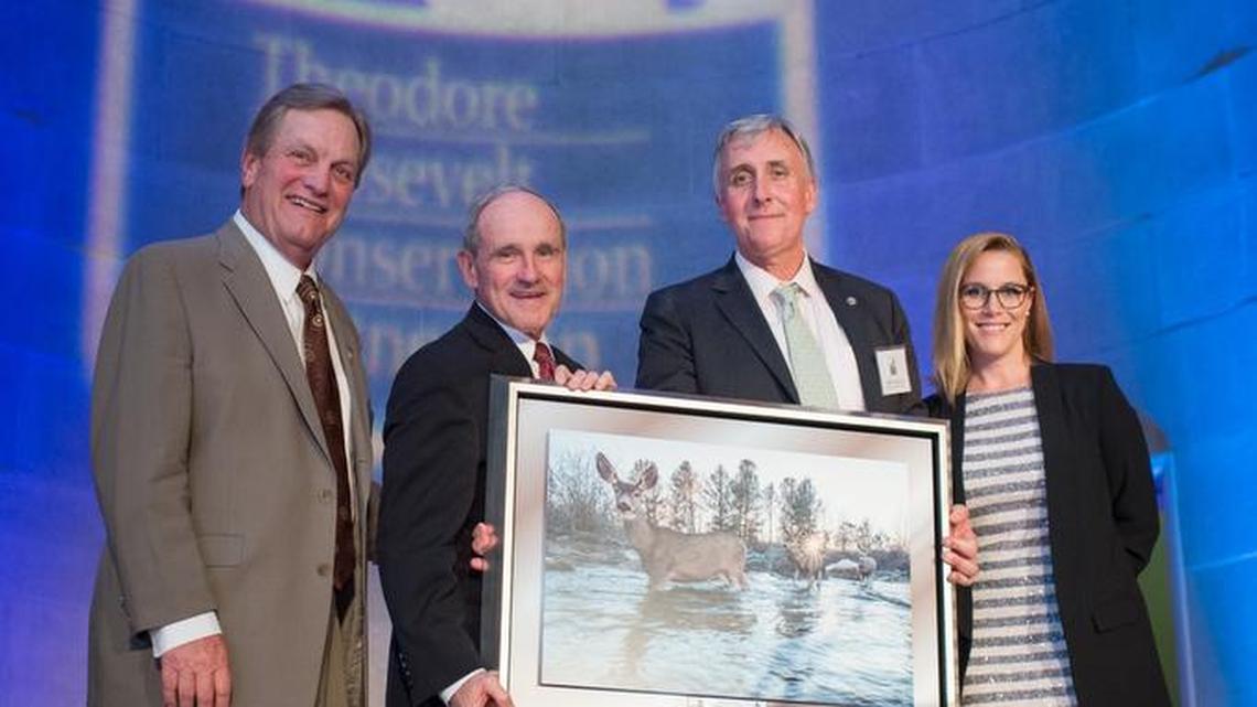 Idaho Rep. Mike Simpson presented Sen. Jim Risch with an award from the Theodore Roosevelt Conservation Partnership April 28. In photo, left to right: Simpson, Risch, TRCP President Whit Fosburgh, MC and political commentator S.E. Cupp.