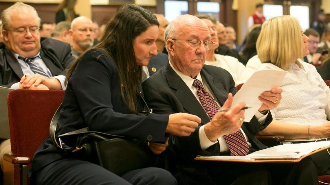 Rep. Ilana Rubel talks with lobbyist Bill Roden, at a House State Affairs Committee in 2015. She is hosting the climate change meeting Wednesday at the Capitol.