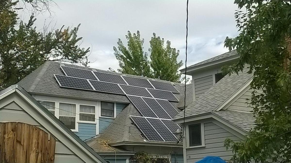 Solar panels installed on an older house as a part of the Solarize the Valley campaign of the Snake River Alliance.