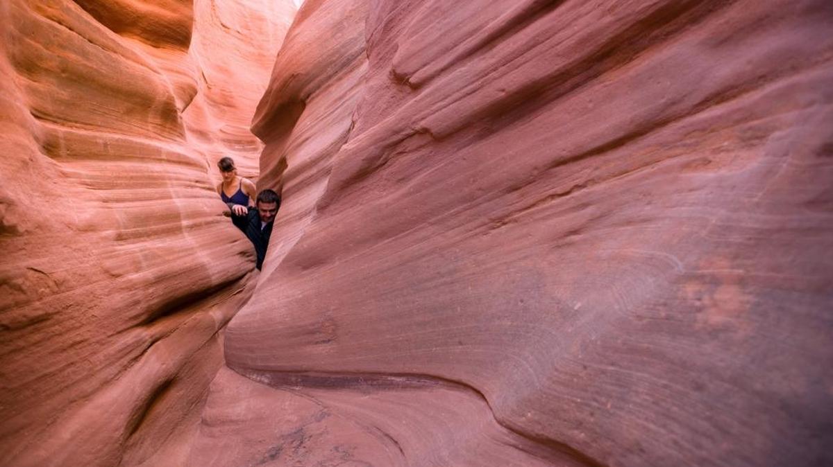 Hikers in Peek-a-Boo Canyon in the Grand Staircase-Escalante National Monument in Escalante, Utah, in October 2008.