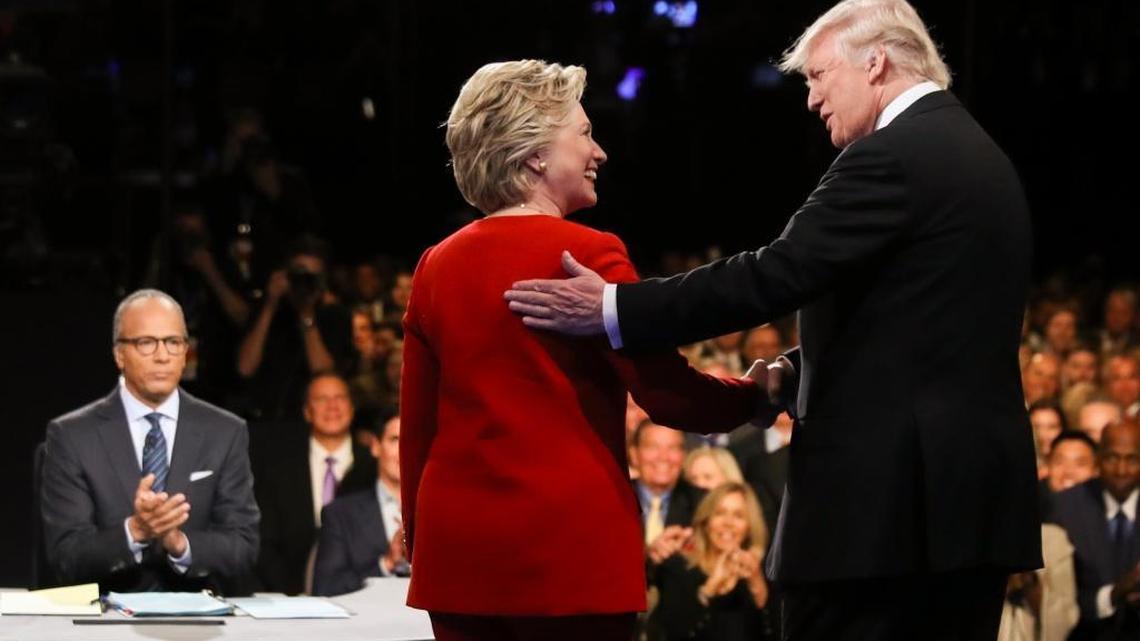 Democratic presidential nominee Hillary Clinton and Republican presidential nominee Donald Trump shake hands during the Sept. 26 presidential debate at Hofstra University in Hempstead, N.Y.