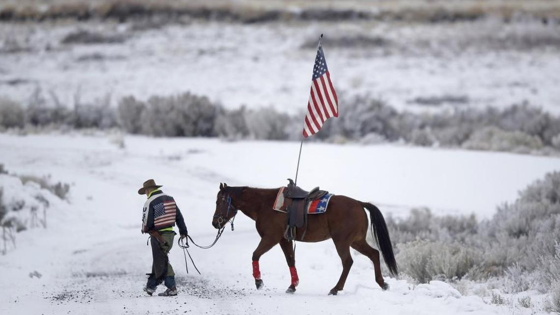 Cowboy Dwane Ehmer, of Irrigon, Ore., a supporter of the group that occupied the Malheur National Wildlife Refuge, walks his horse near Burns, Ore., in January.