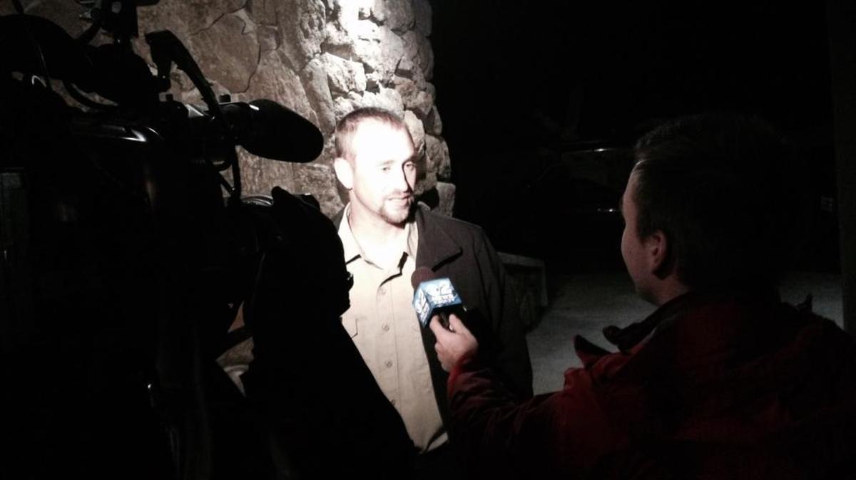 Adams County Sheriff Ryan Zollman is interviewed by Boise reporters after the town hall Tuesday on the Yantis shooting.