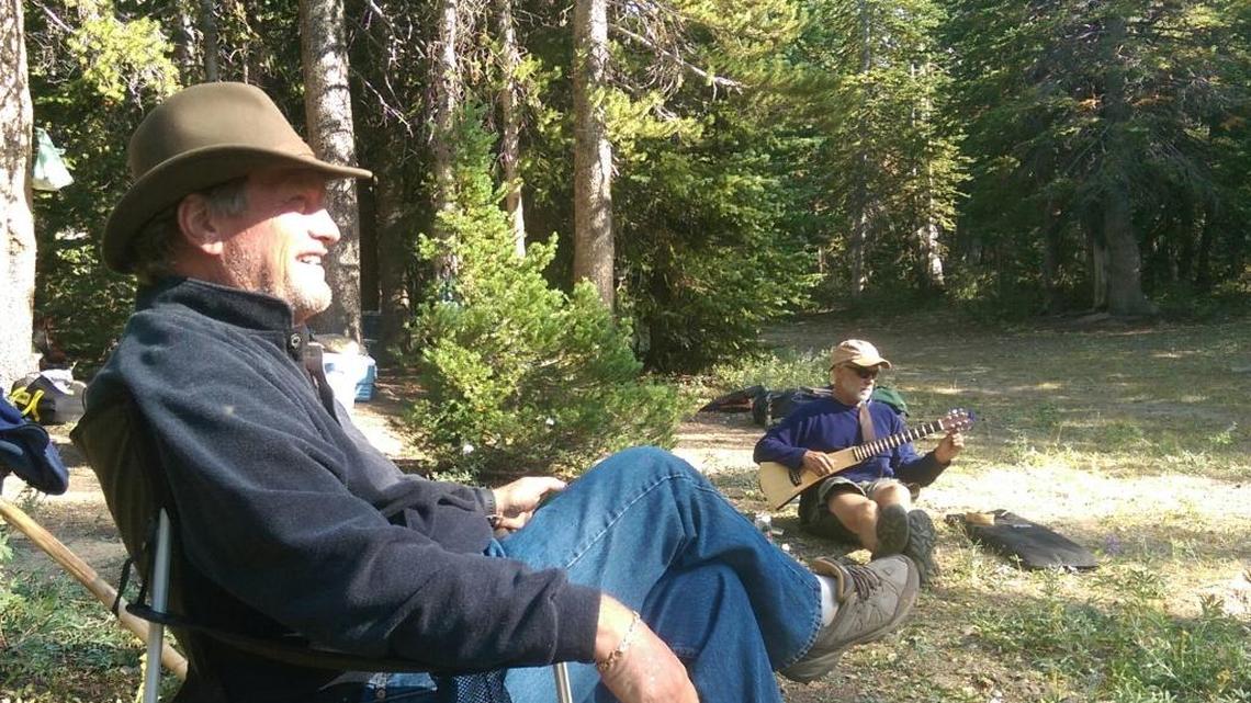 Republican Rep. Mike Simpson and Idaho Conservation League Director Rick Johnson lounge at Chamberlain Lake in the White Clouds Wilderness in August after hiking into the area they helped protect.