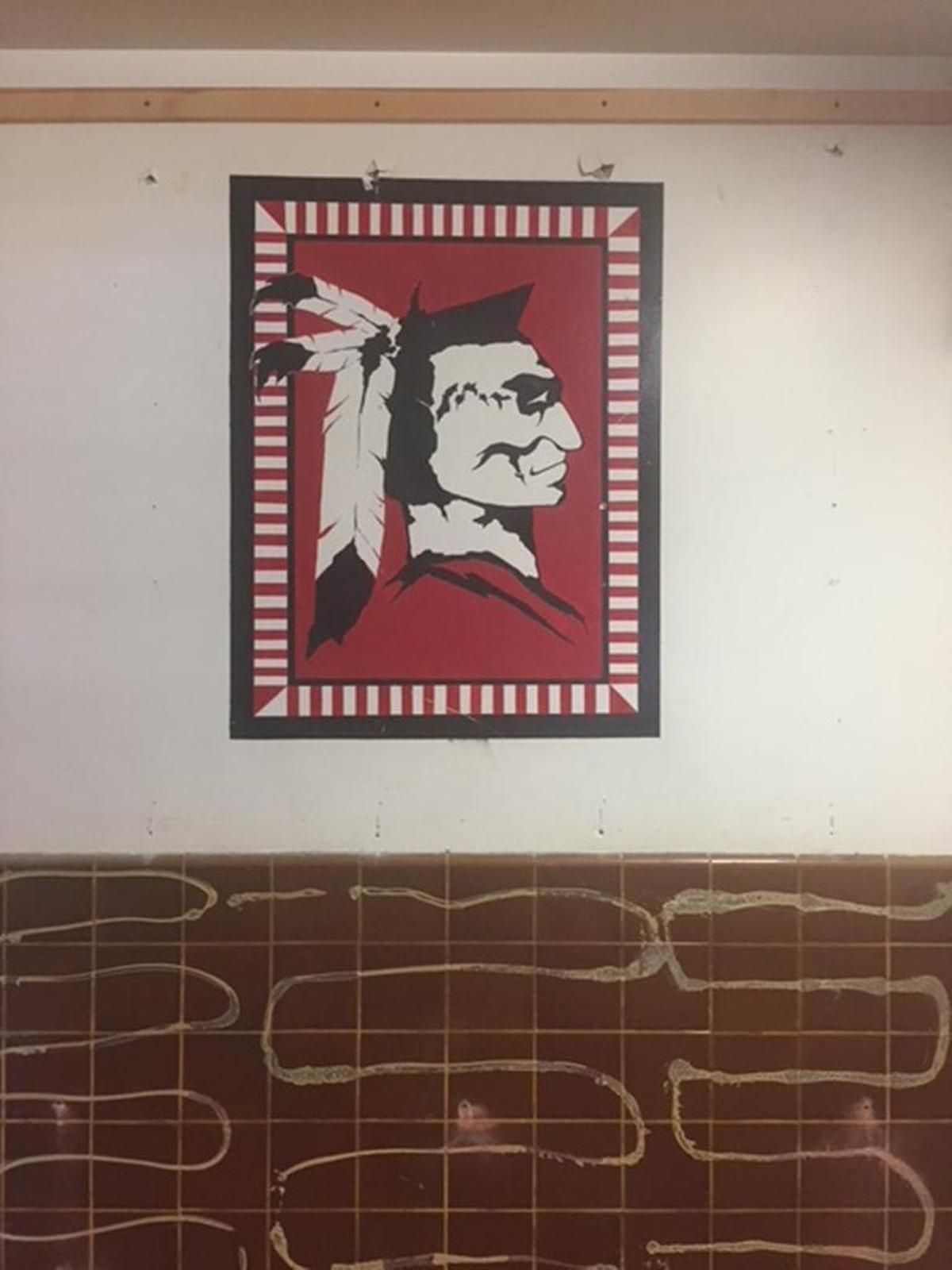 Two murals of a stylized Boise Brave were discovered behind a heavy trophy case during gymnasium construction at Boise High School. Only this one could be saved. For months, school officials wondered who the artist was.