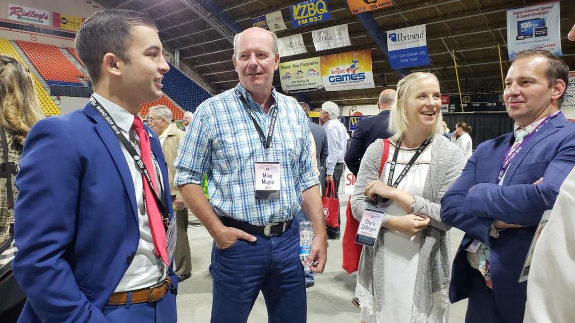 Dom Gelsomino, left, talks to Rep. Mike Moyle, Shara Zollinger and Rep. Bryan Zollinger before Saturday’s floor session at the Idaho Republican Party convention. After Gelsomino argued unsuccessfully for the Republican Party to support marriage equality in its platform, Zollinger tweeted out a message of support: “We as Republicans are and need to remain the party of inclusion.”