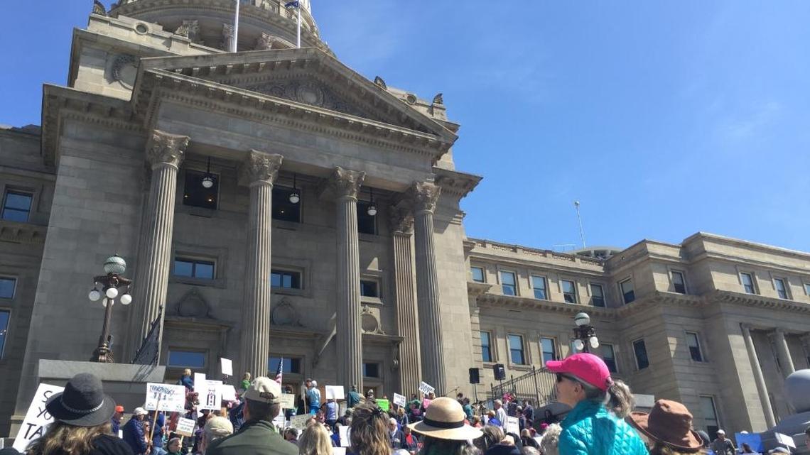 Protesters gathered at the Idaho capitol Saturday morning as part of Tax Day marches across the country calling on President Donald Trump to release his tax returns.