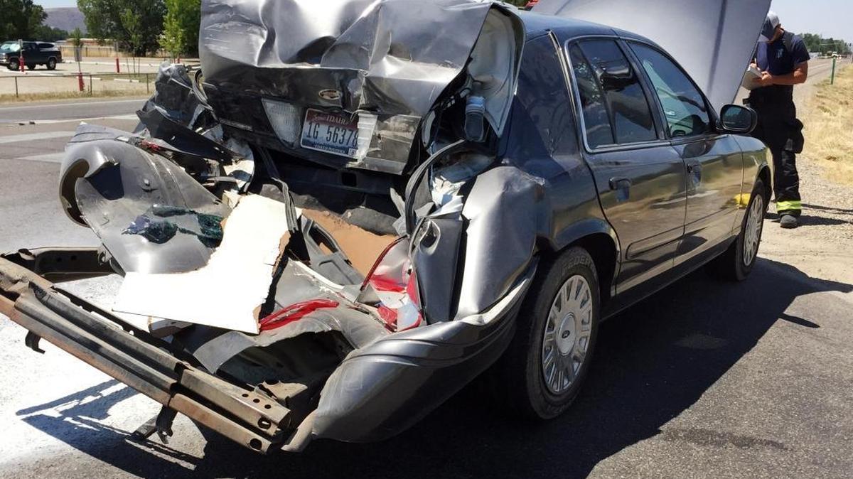 The back of Emmett Police Chief Gary Scheihing’s police car sustained serious damage after being struck Wednesday afternoon by a semi-truck. Photo provided by the City of Emmett.