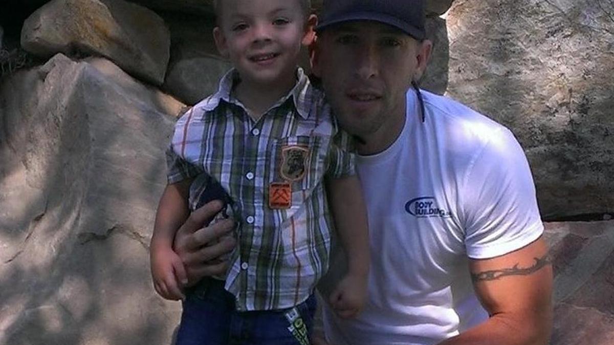 Matthew Conrad poses with his son, Elijah, now 5, during a July 2015 visit to Park City, Utah, where Conrad’s sister, Megan Thomas, resides.