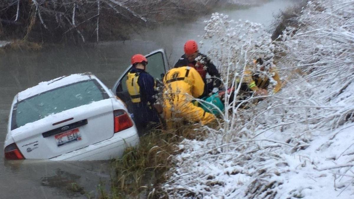 Rescuers at the scene Saturday morning.